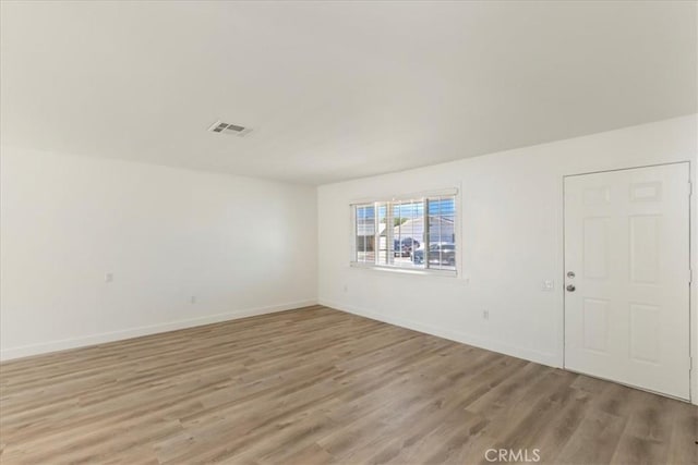 43000 Connecticut St, Palm Desert, CA 92211 - spare room with light wood-style floors and baseboards