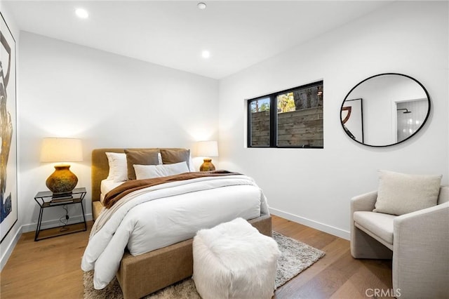 9551/2 Everett St, Los Angeles, CA 90026 - bedroom with wood finished floors and recessed lighting