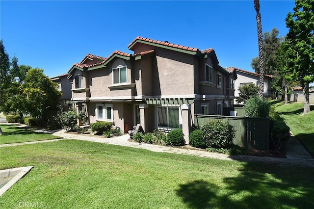 10246 Chaparral Way Unit G, Rancho Cucamonga, CA 91730 - view of front of house featuring stucco siding and a tiled roof