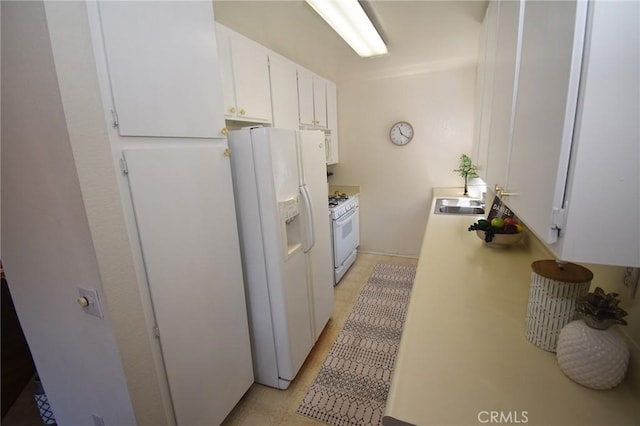 10246 Chaparral Way Unit G, Rancho Cucamonga, CA 91730 - kitchen with white appliances, light countertops, and white cabinets