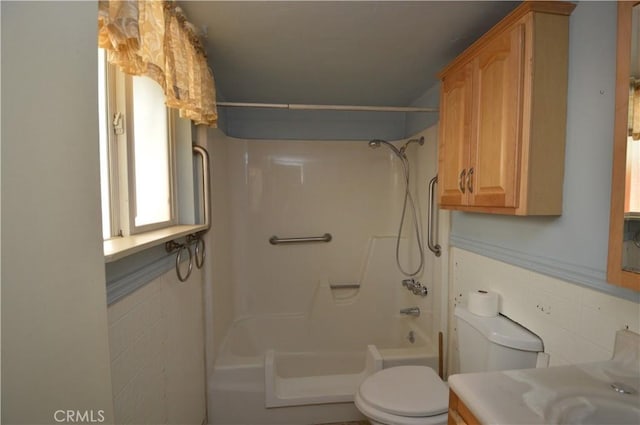 2062 9th Ln, Big Bear City, CA 92314 - bathroom featuring tile walls and bathing tub / shower combination