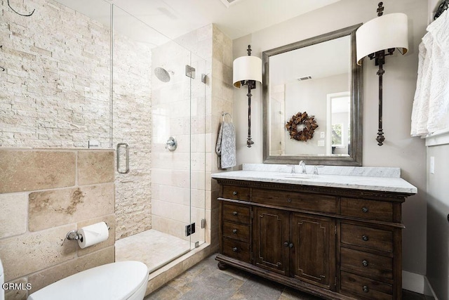 3041 Fairlea Rd, Santa Ynez, CA 93460 - bathroom featuring vanity, a stall shower, and stone finish flooring