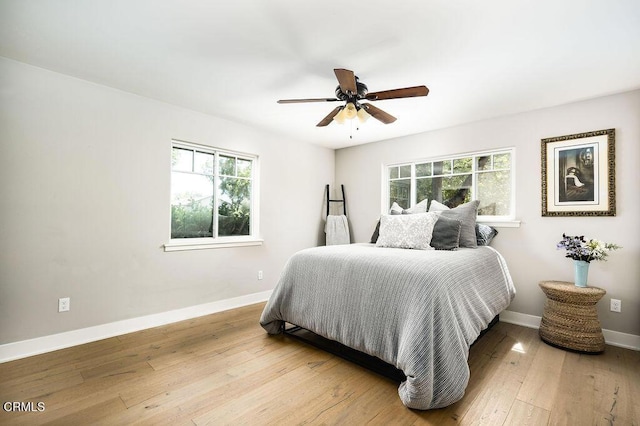 3041 Fairlea Rd, Santa Ynez, CA 93460 - bedroom with multiple windows, hardwood / wood-style floors, and a ceiling fan