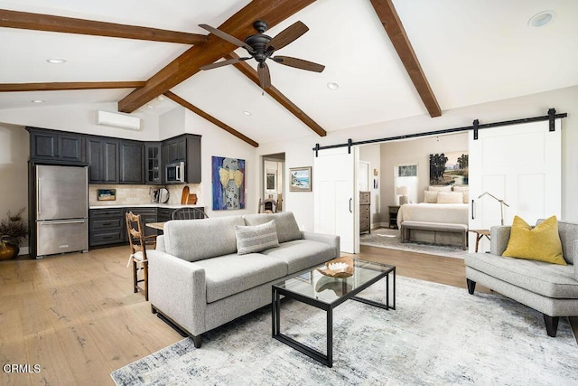 3041 Fairlea Rd, Santa Ynez, CA 93460 - living room with a barn door, a ceiling fan, light wood finished floors, and recessed lighting