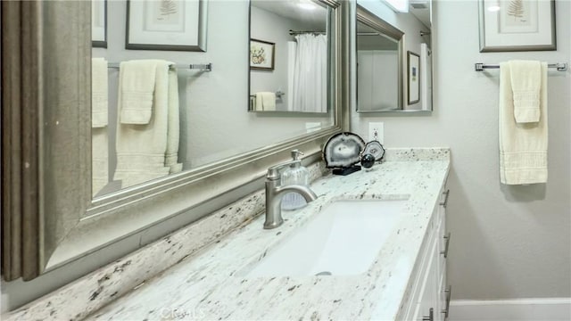 24055 W Paseo Del Lago Unit 753, Laguna Woods, CA 92637 - full bath with vanity and baseboards