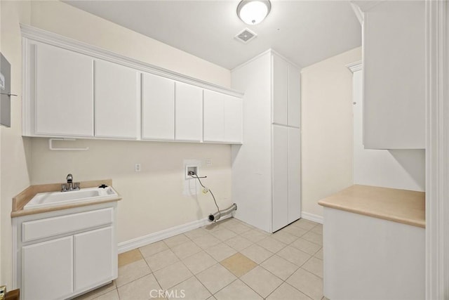 2832 Oak Knoll Dr, Diamond Bar, CA 91765 - laundry room featuring cabinet space, hookup for a washing machine, and light tile patterned floors