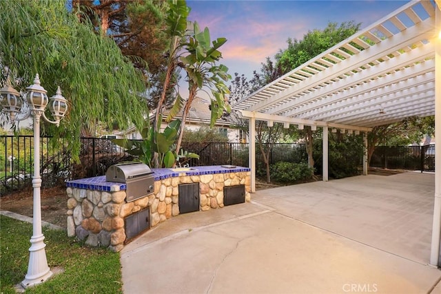 2832 Oak Knoll Dr, Diamond Bar, CA 91765 - fenced backyard with an outdoor kitchen, a pergola, and a patio