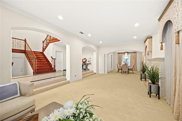 2832 Oak Knoll Dr, Diamond Bar, CA 91765 - living area featuring light carpet, arched walkways, ornamental molding, recessed lighting, and stairs