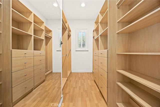 2832 Oak Knoll Dr, Diamond Bar, CA 91765 - walk in closet featuring light wood-type flooring
