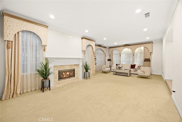 2832 Oak Knoll Dr, Diamond Bar, CA 91765 - living area featuring crown molding, carpet flooring, recessed lighting, a tile fireplace, and arched walkways