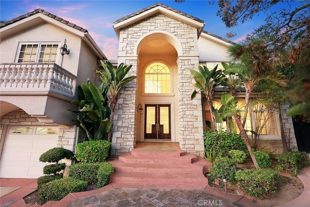 2832 Oak Knoll Dr, Diamond Bar, CA 91765 - entrance to property with french doors, stucco siding, a balcony, stone siding, and a tiled roof