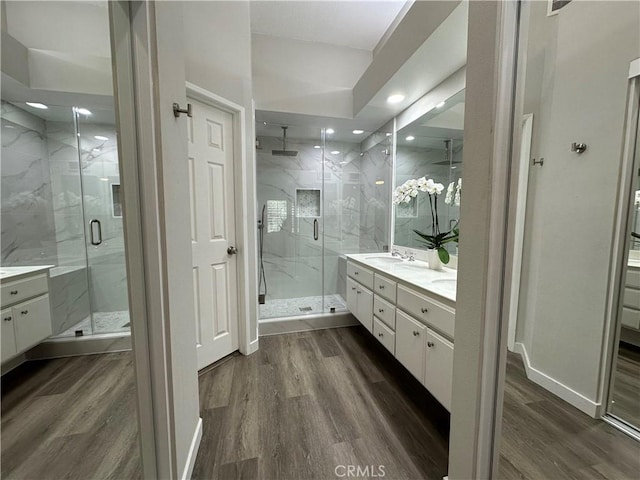 27721 Rubidoux, Mission Viejo, CA 92692 - bathroom with vanity, recessed lighting, a marble finish shower, and wood finished floors