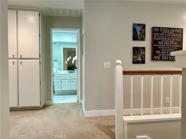 27721 Rubidoux, Mission Viejo, CA 92692 - hallway featuring light colored carpet and baseboards
