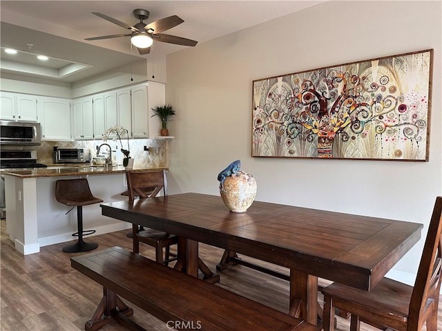27721 Rubidoux, Mission Viejo, CA 92692 - dining space featuring ceiling fan, dark wood-style floors, recessed lighting, and a raised ceiling