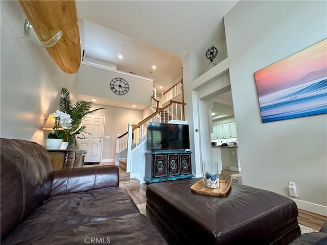 27721 Rubidoux, Mission Viejo, CA 92692 - living area featuring stairway, wood finished floors, recessed lighting, and a high ceiling