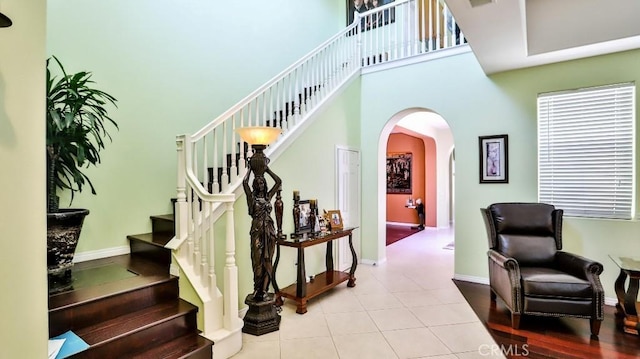 2056 Mission Hills Dr, Oxnard, CA 93036 - stairway featuring arched walkways and tile patterned floors