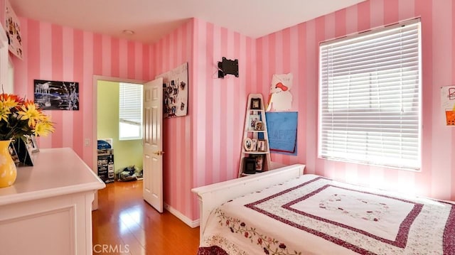 2056 Mission Hills Dr, Oxnard, CA 93036 - bedroom with light wood-type flooring and wallpapered walls