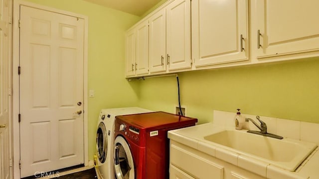 2056 Mission Hills Dr, Oxnard, CA 93036 - washroom with cabinet space and washer and clothes dryer