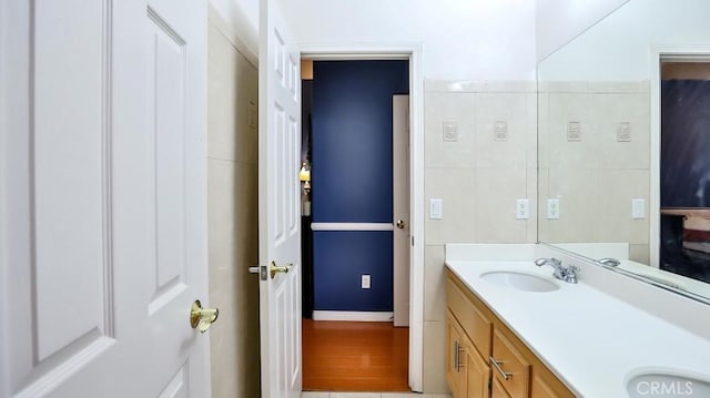 2056 Mission Hills Dr, Oxnard, CA 93036 - bathroom featuring double vanity and baseboards