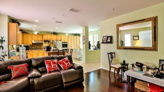 2056 Mission Hills Dr, Oxnard, CA 93036 - living area featuring wood finished floors and recessed lighting