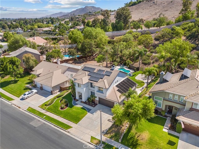775 Via Blairo, Corona, CA 92879 - aerial view of residential area with a mountainous background and a pool area
