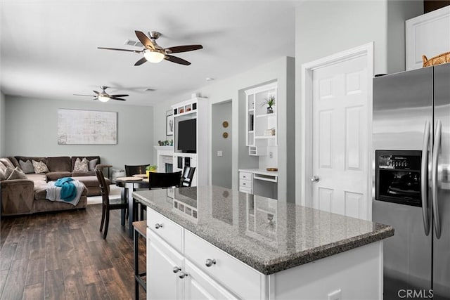 775 Via Blairo, Corona, CA 92879 - kitchen featuring stainless steel fridge with ice dispenser, a ceiling fan, dark wood finished floors, open floor plan, and white cabinetry