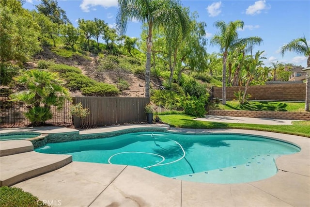 775 Via Blairo, Corona, CA 92879 - view of pool with a fenced backyard, a pool with connected hot tub, and a patio area