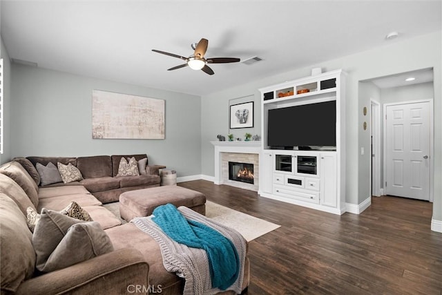 775 Via Blairo, Corona, CA 92879 - living room featuring a ceiling fan, dark wood-style flooring, a glass covered fireplace, and recessed lighting