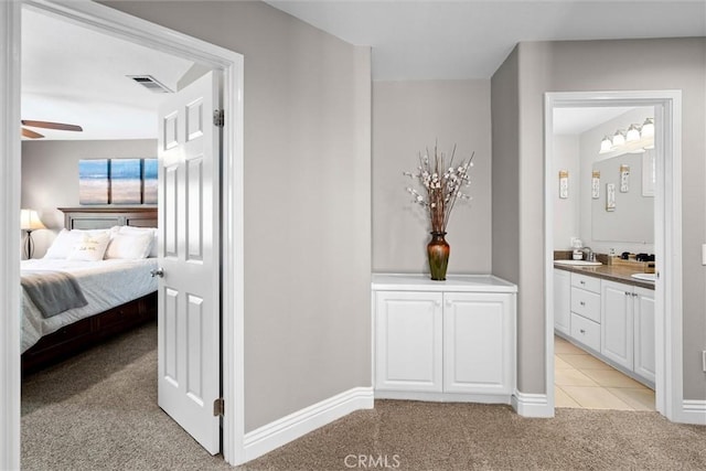 775 Via Blairo, Corona, CA 92879 - corridor featuring light carpet and light tile patterned floors