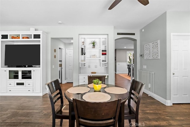 775 Via Blairo, Corona, CA 92879 - dining room featuring ceiling fan, arched walkways, and dark wood-style flooring