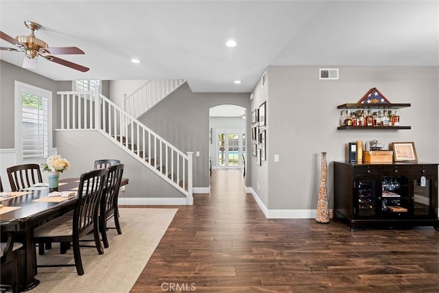 775 Via Blairo, Corona, CA 92879 - dining space featuring arched walkways, a ceiling fan, wood finished floors, stairway, and recessed lighting