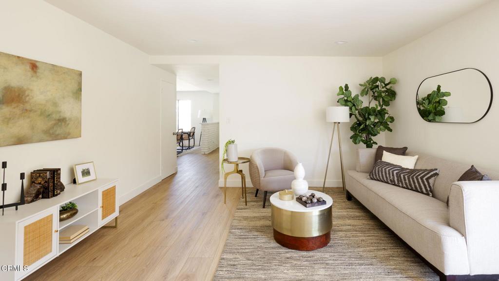 9465 E Camino Real Ave, Arcadia, CA 91007 - living room with light wood-type flooring and baseboards