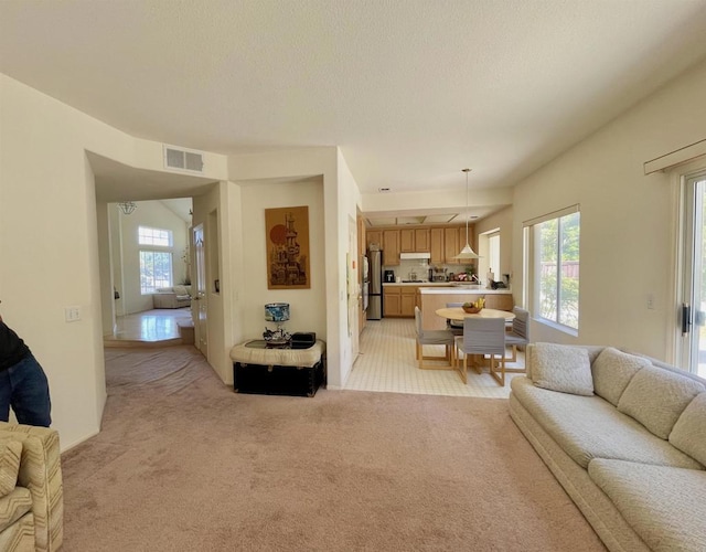 659 Rosita Ct, Chula Vista, CA 91910 - living area featuring light colored carpet and a textured ceiling