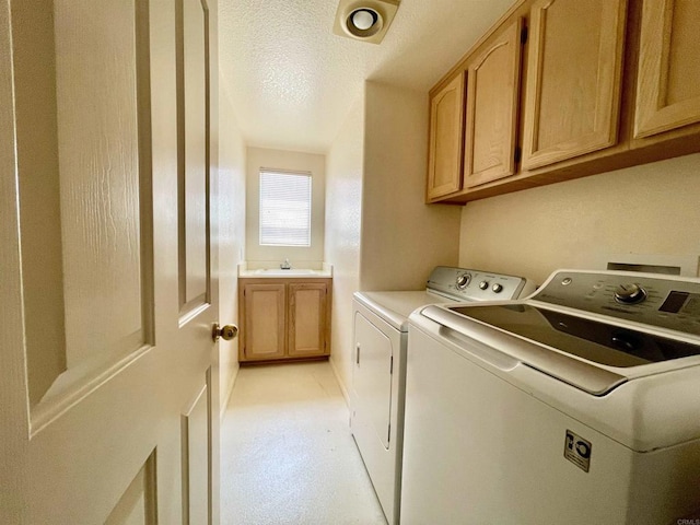 659 Rosita Ct, Chula Vista, CA 91910 - washroom featuring independent washer and dryer, cabinet space, and a textured ceiling