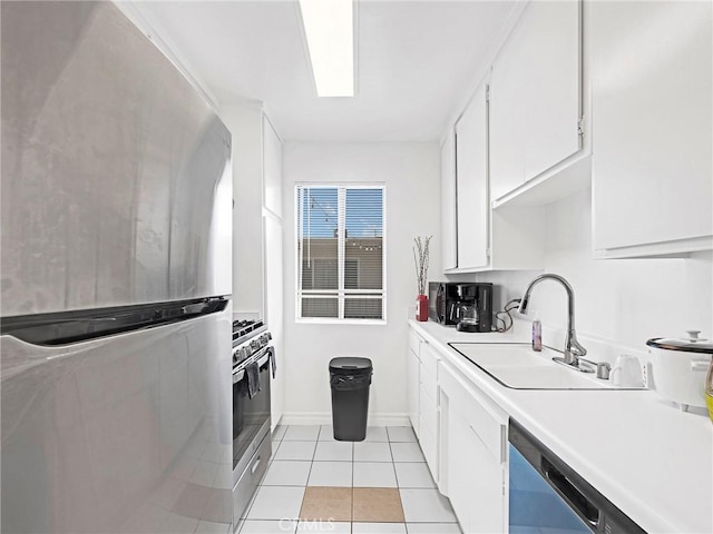 525 S Shelton St Unit 205, Burbank, CA 91506 - kitchen featuring appliances with stainless steel finishes, light countertops, white cabinets, and light tile patterned floors
