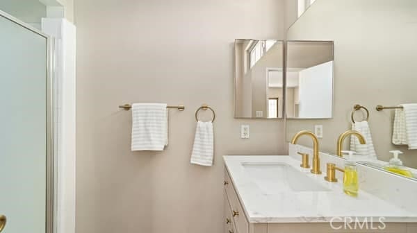 1724 S Vecino Ave, Glendora, CA 91740 - bathroom with vanity and an enclosed shower