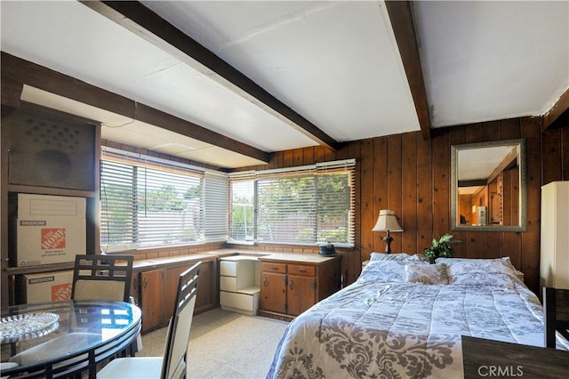12108 Muriel Dr, Lynwood, CA 90262 - bedroom with beamed ceiling, wooden walls, and light colored carpet