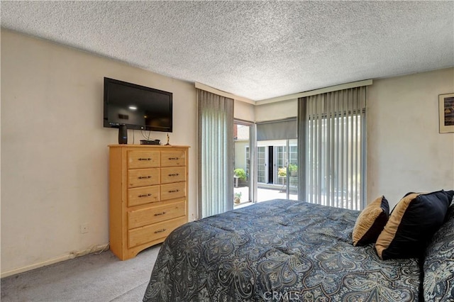 12108 Muriel Dr, Lynwood, CA 90262 - carpeted bedroom with a textured ceiling and baseboards