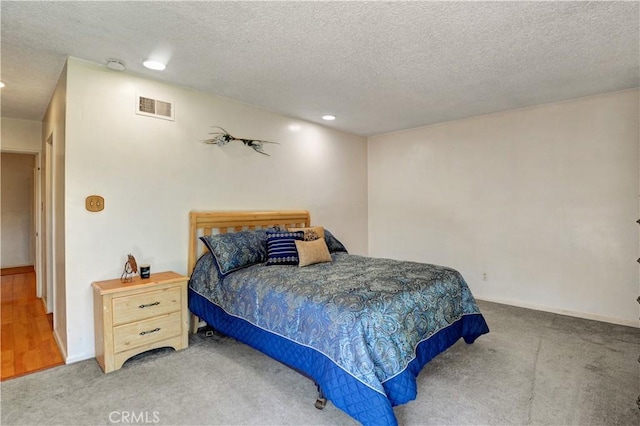 12108 Muriel Dr, Lynwood, CA 90262 - bedroom featuring carpet floors, a textured ceiling, and recessed lighting