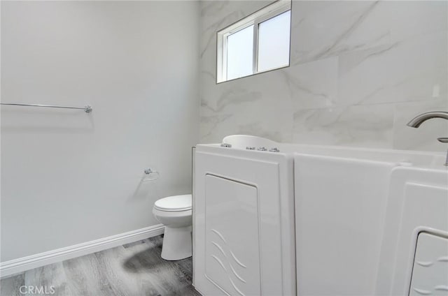 12517 Walcroft St, Lakewood, CA 90715 - bathroom featuring toilet and wood finished floors