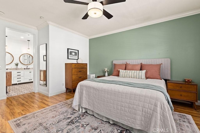 5 Duxbury St, Ladera Ranch, CA 92694 - bedroom with wood finished floors, ornamental molding, ensuite bathroom, and a ceiling fan