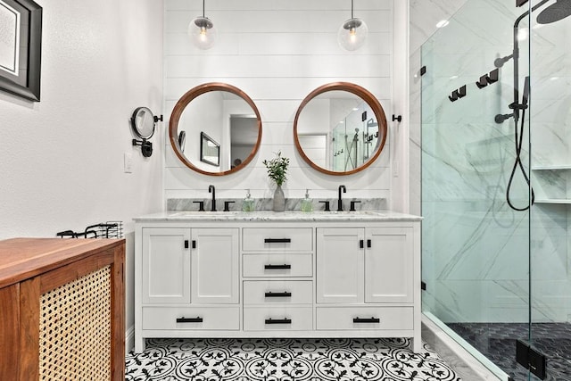 5 Duxbury St, Ladera Ranch, CA 92694 - bathroom with a marble finish shower, double vanity, and tile patterned floors