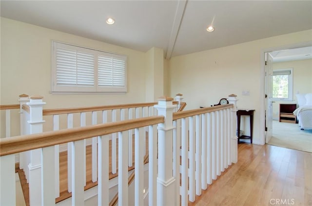 1251 Hackett Ave, Long Beach, CA 90815 - hallway with an upstairs landing, light wood-style floors, and recessed lighting