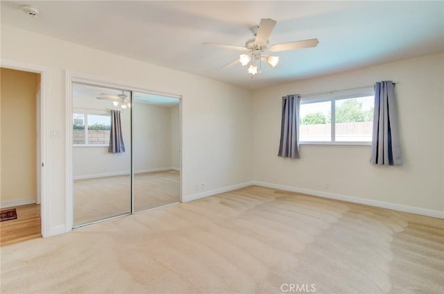 1251 Hackett Ave, Long Beach, CA 90815 - unfurnished bedroom featuring carpet flooring, a closet, and a ceiling fan