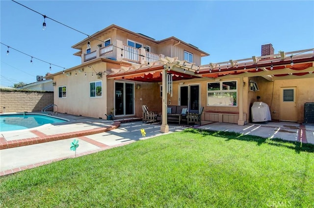 1251 Hackett Ave, Long Beach, CA 90815 - back of property with a balcony, stucco siding, a patio, outdoor lounge area, and a chimney