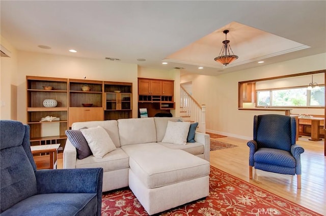 1251 Hackett Ave, Long Beach, CA 90815 - living room with light wood-style floors, stairs, recessed lighting, and a tray ceiling