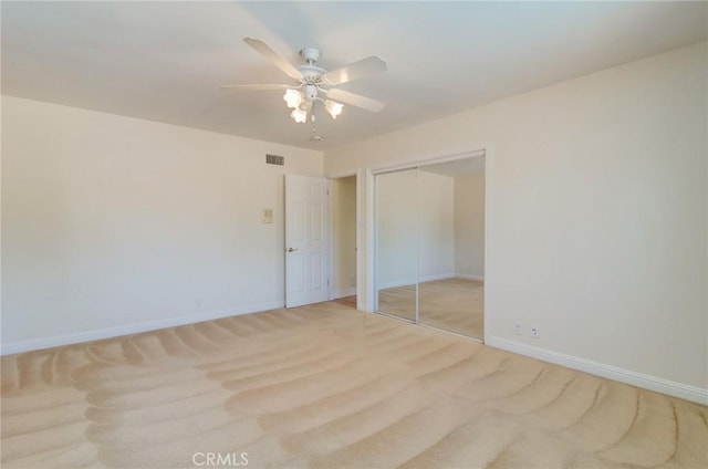 1251 Hackett Ave, Long Beach, CA 90815 - unfurnished bedroom with carpet, a closet, and a ceiling fan