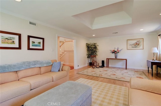1251 Hackett Ave, Long Beach, CA 90815 - living room featuring light wood-type flooring, stairs, recessed lighting, and crown molding