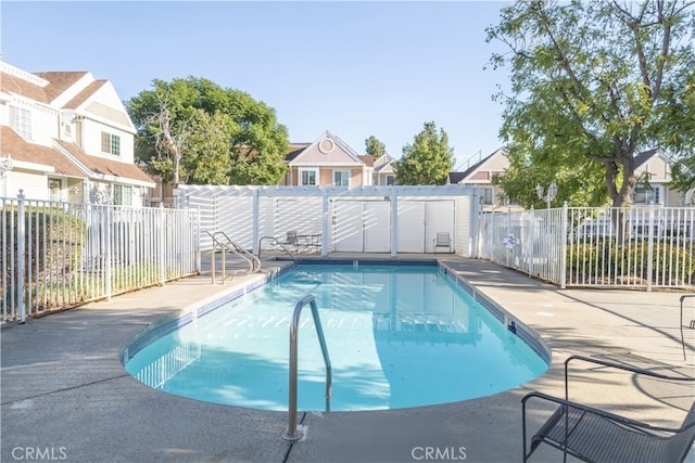 13750 Hubbard St Unit 77, Sylmar, CA 91342 - community pool featuring a residential view and a patio