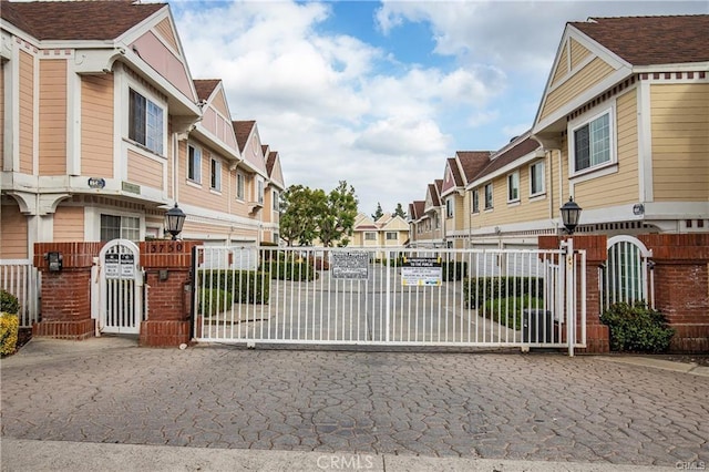 13750 Hubbard St Unit 77, Sylmar, CA 91342 - gate featuring a residential view